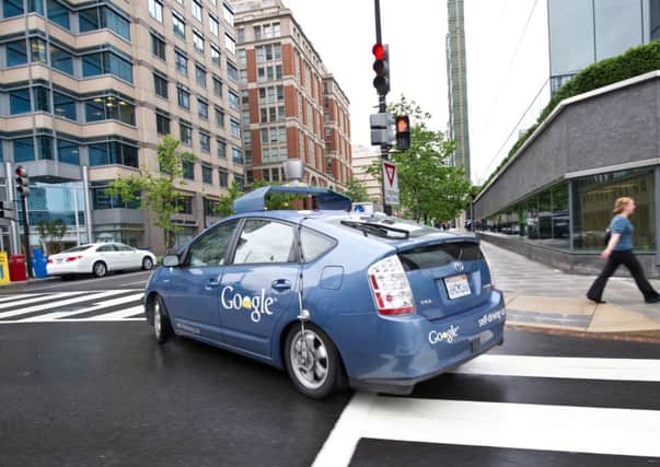 Cars with drivers will become problems as more driverless vehicles appear. Picture: AFP/Getty