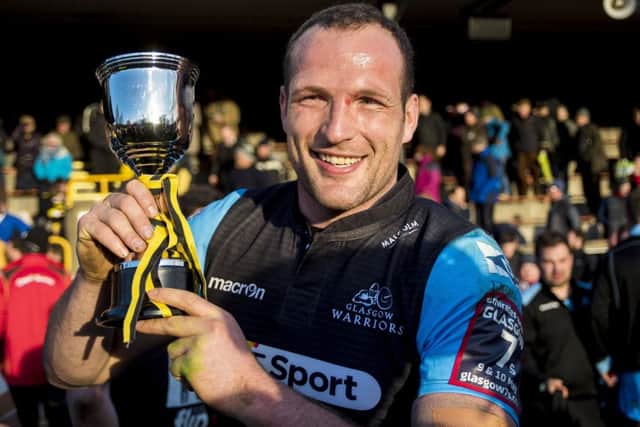Glasgow Warriors' James Eddie celebrates having won the tournament. Picture: SNS
