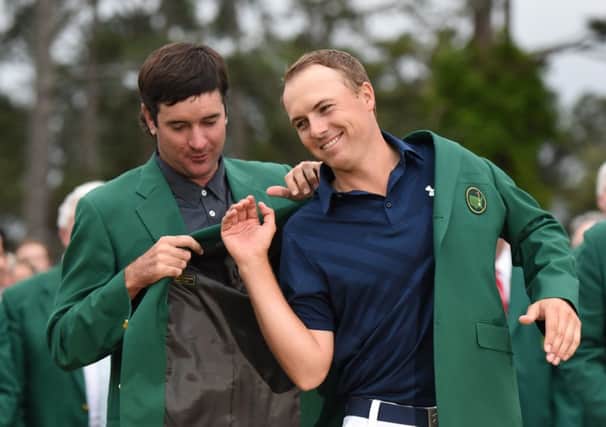 Masters defending champion Bubba Smith places the Green Jacket on 2015 Champion Jordan Spieth. Picture: Getty