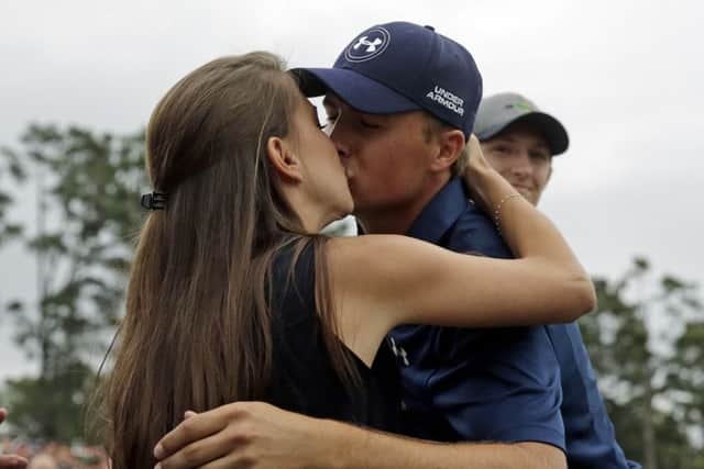 A kiss for girlfriend Annie Verret. Picture: AP