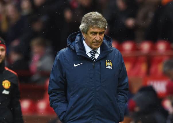 Manuel Pellegrini is a picture of woe as his team loses 42 to rivals United on Sunday. Picture: Getty