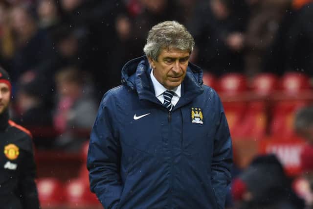 Manuel Pellegrini is a picture of woe as his team loses 42 to rivals United on Sunday. Picture: Getty