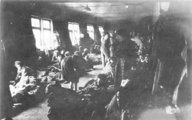 The squalid interior of one of the huts at Bergen-Belsen. Picture: SWNS