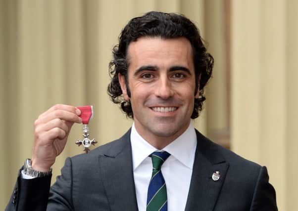 Dario Franchitti with his MBE. Picture: Getty