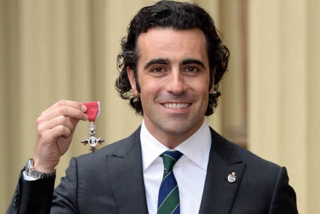 Dario Franchitti with his MBE. Picture: Getty
