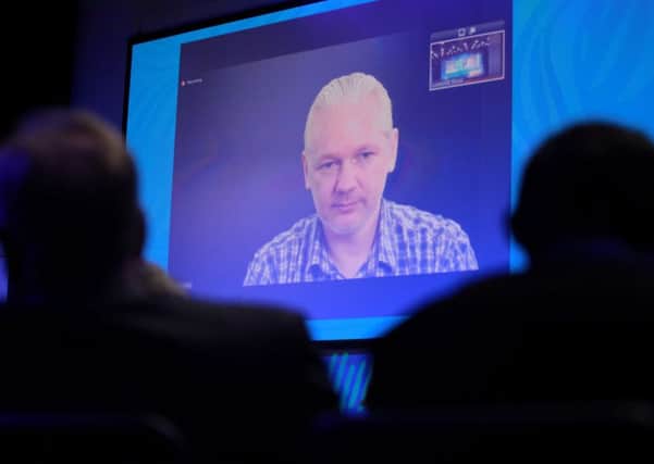 Julian Assange addresses lawyers and judges via video link at the Commonwealth Law Conference in Glasgow. Picture: Hemedia