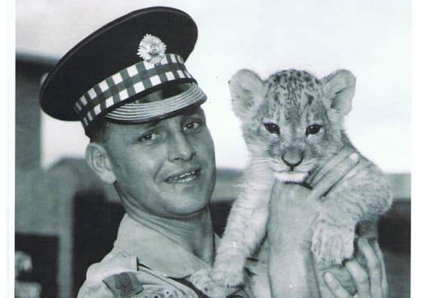 Scots Guard who looked after the lion cubs that went on to star in the film Born Free. Picture: Contributed