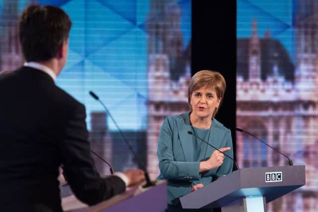 Nicola Sturgeon debates with Ed Miliband during the BBC Challengers' Election Debate. AFP/Getty