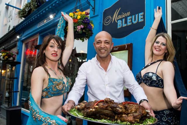 Dean Gassabi, a couple of belly dancers and a Bedouin Méchoui Feast at his restaurant relaunch. Picture: TSPL