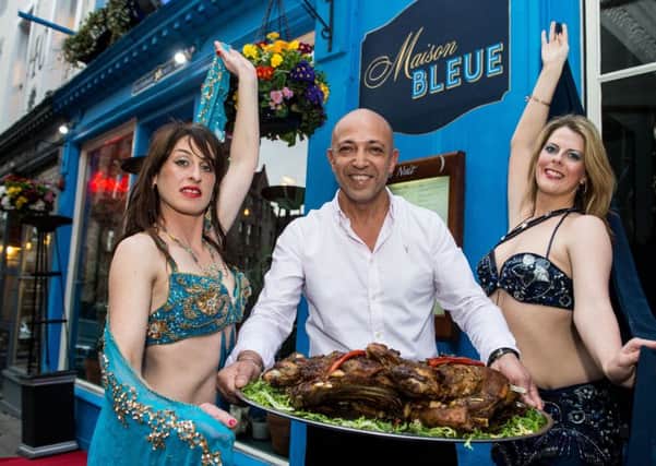 Dean Gassabi, a couple of belly dancers and a Bedouin Méchoui Feast at his restaurant relaunch. Picture: TSPL