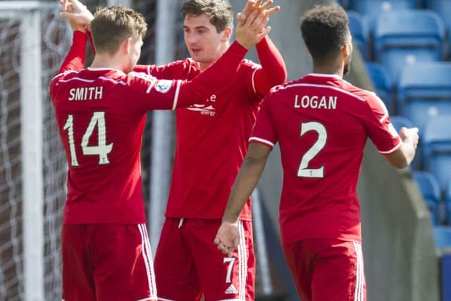 Kenny McLean, centre: Out to spoil Celtic title party. Picture: SNS