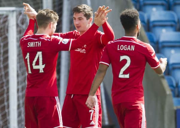 Kenny McLean, centre: Out to spoil Celtic title party. Picture: SNS