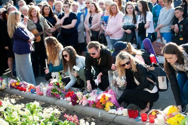 Tributes are left by mourners for mudered Irish studen Karen Buckley. John Devlin