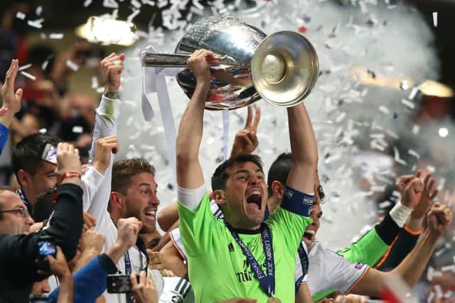 Iker Casillas of Real Madrid lifts the Champions League trophy after victory over Atletico last year. Picture: Getty