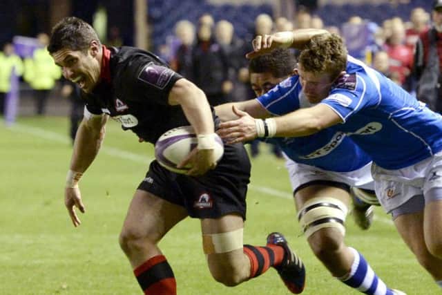 Edinburghs Phil Burleigh storms clear during the capital sides European Challenge Cup victory. Picture: SNS