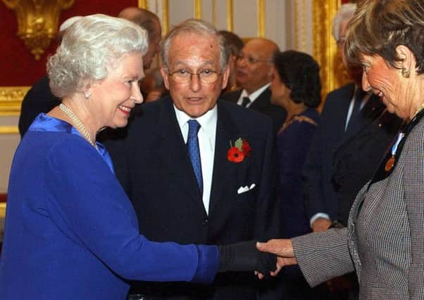 The Queen and Lord Janner at a reception in St Jamess Palace in October 2003. Picture: Kirsty Wigglesworth/AFP/Getty Images