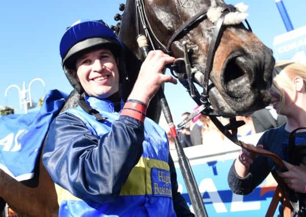 Delight for jockey Robbie Dunne. Picture: SNS