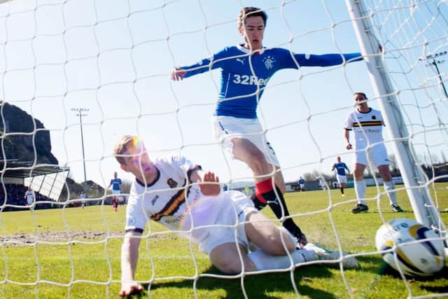 Ryan Hardie slots the ball ino the net . Picture: SNS