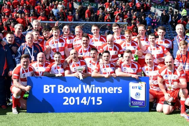 Alloa celebrate winning the BT Bowl Final. Picture: SNS
