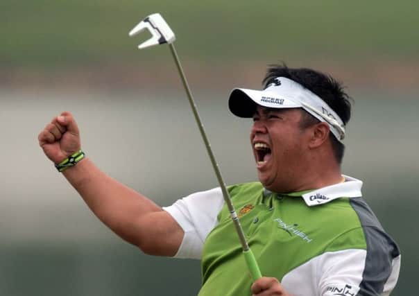Kiradech Aphibarnrat of Thailand celebrates winning the inaugural Shenzhen International golf tournament. Picture: AP