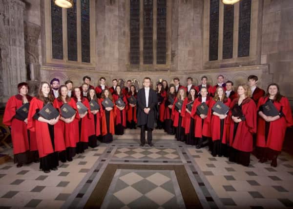 The University of St Andrews Chapel Choir with its 
musical director Tom Wilkinson. Picture: Contributed