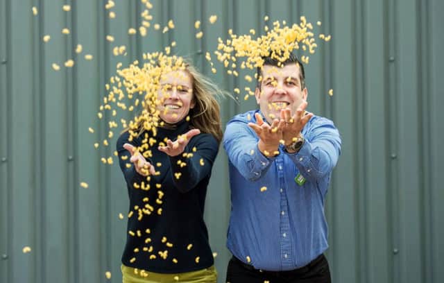 Asdas Brian OShea and Julie Nisbet, of McIntosh owner Strathmore Foods, celebrate the macaroni pots deal Picture: Ian Georgeson