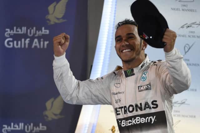 Lewis Hamilton celebrates on the podium after winning the Bahrain GP. Picture: AFP/Getty