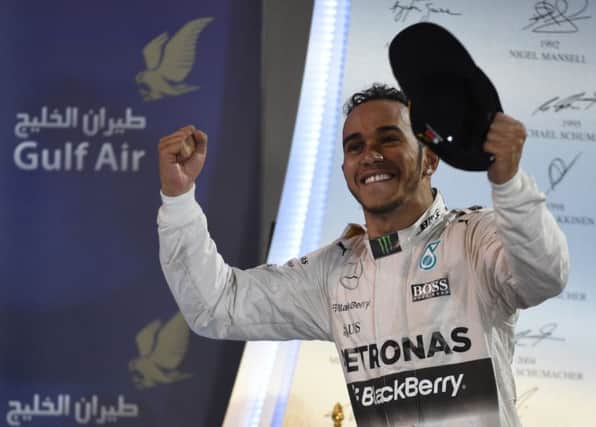 Lewis Hamilton celebrates on the podium after winning the Bahrain GP. Picture: AFP/Getty