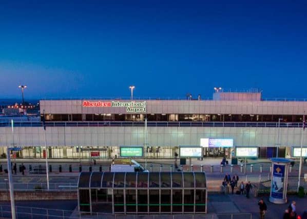 Aberdeen Airport. A man was fined £60 for staying at the airport's drop-off zone for too long after stopping to let his wife feed their baby. Picture: Contributed