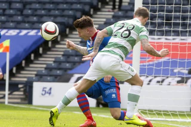Celtic's Leigh Griffiths heads the ball off of Inverness Caledonian Thistle's Josh Meekings. Picture: Getty