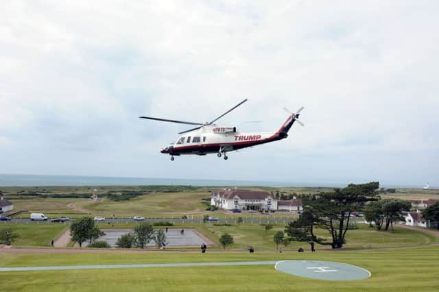 Donald Trump lands at a Turnberry press conference following his takeover in July last year. Picture: John Devlin