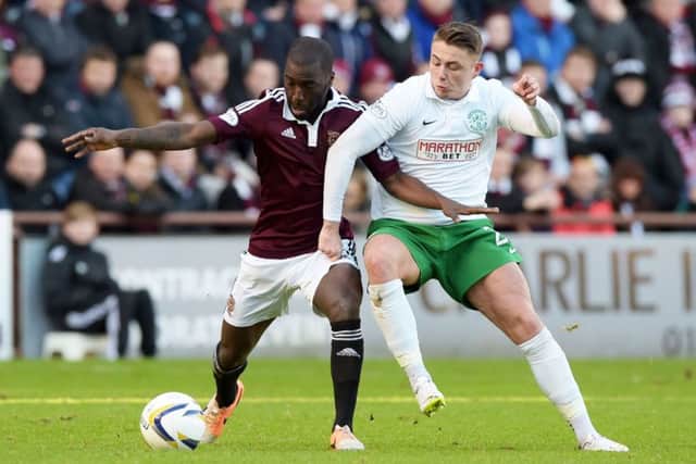 Hearts' Morgaro Gomis and Hibs' Scott Allan are two of four Capital-based players on the shortlist for the Championship player of the year. Pic: SNS