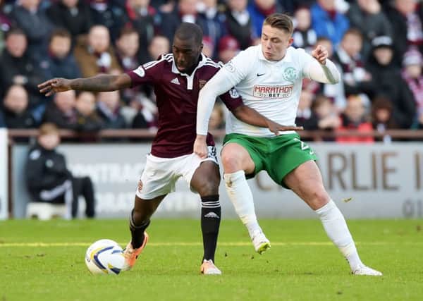Hearts' Morgaro Gomis and Hibs' Scott Allan are two of four Capital-based players on the shortlist for the Championship player of the year. Pic: SNS