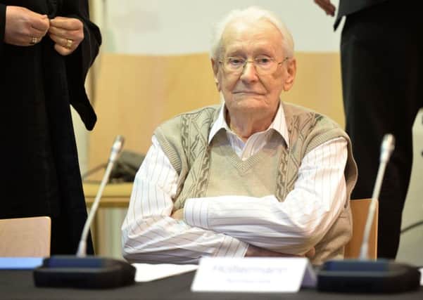 Former Nazi death camp officer Oskar Groening waits at court for the opening of his trial. Picture: AFP/Getty