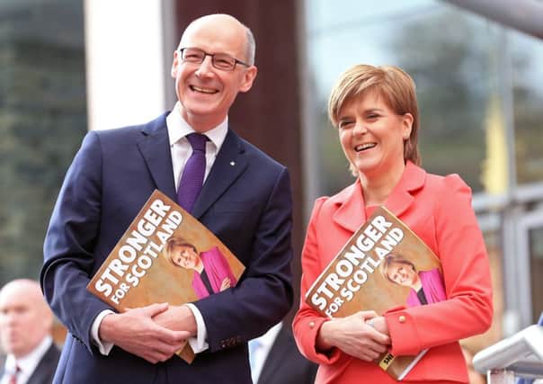Nicola Sturgeon launches the SNP General Election Manifesto at Ratho Climbing Centre with John Swinney. Picture: Gordon Fraser
