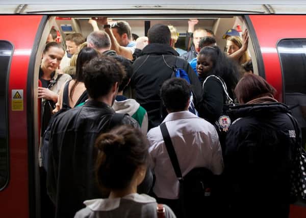 Standing room only  using the Tube at the rush hour can only be described as a nightmare. Picture: AFP/Getty