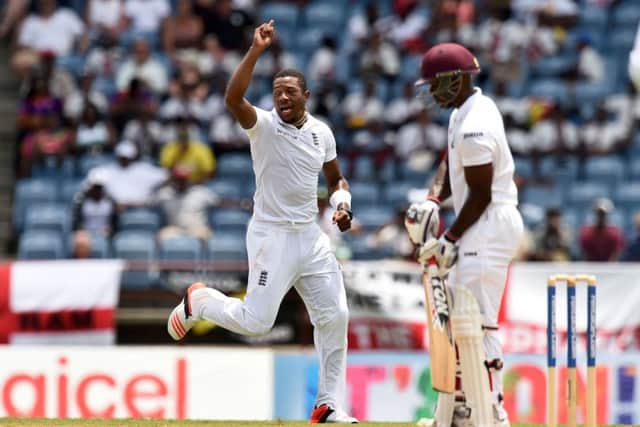 England's Chris Jordan celebrates dismissing West Indies batsman Devon Smith. Picture: AFP/Getty