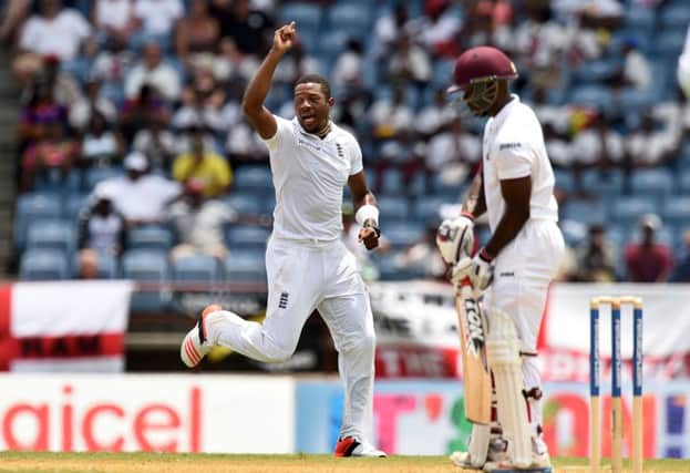 England's Chris Jordan celebrates dismissing West Indies batsman Devon Smith. Picture: AFP/Getty