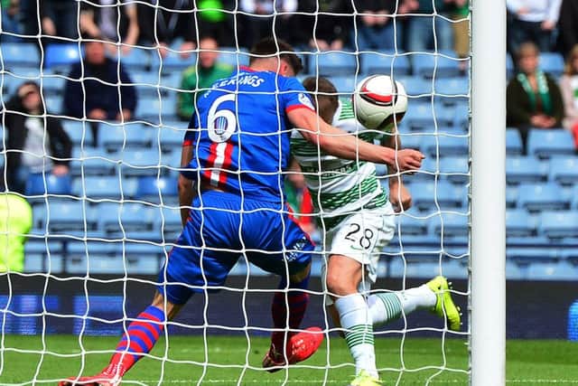 Josh Meekings of Caledonian Thistle handles the ball on the goal line  during Sunday's Scottish Cup semi-final against Celtic. Picture: Getty