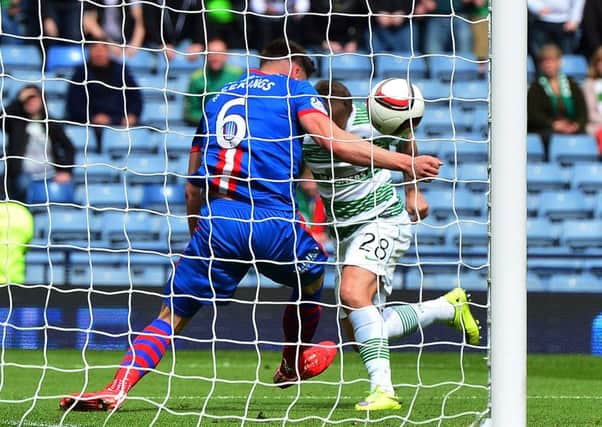 Josh Meekings of Caledonian Thistle handles the ball on the goal line  during Sunday's Scottish Cup semi-final against Celtic. Picture: Getty