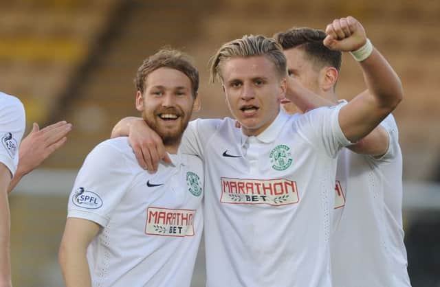 Jason Cummings, right, with Martin Boyle, celebrates putting Hibs back in front. Picture: Neil Hanna