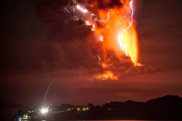 This view from Frutillar, southern Chile, shows a high column of ash and lava spewing from the Calbuco volcano. Picture: Getty