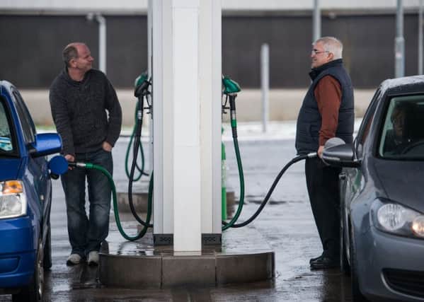 Motorists refuel their cars at an Asda petrol station at Straiton, Loanhead. Picture: Ian Georgeson