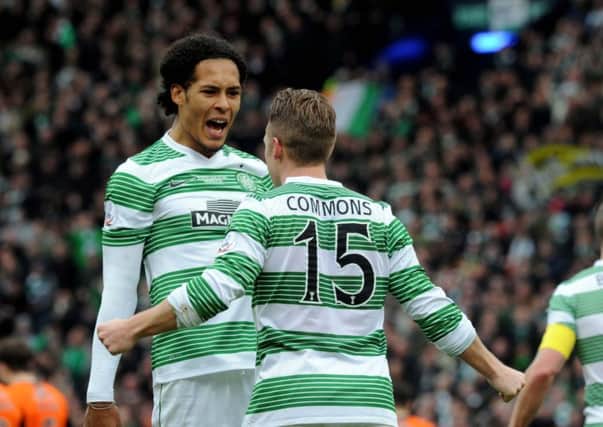 Virgil van Dijk, celebrating with last year's PFA Scotland player of the year Kris Commons, has been shortlisted for this year's award. Picture: Lisa Ferguson