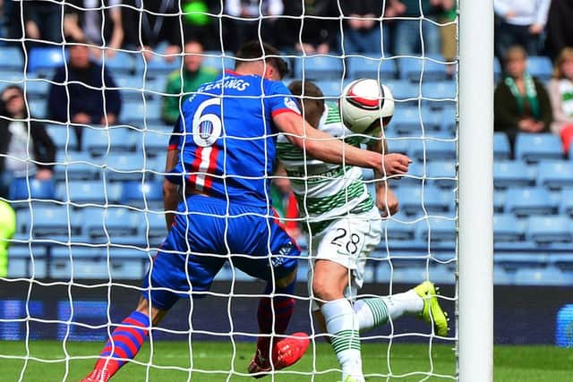 osh Meekings of Caledonian Thistle apparently handles the ball on the goal line from Leigh Griffiths of Celtic . Picture: Getty