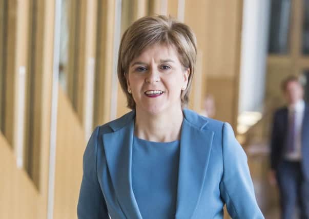 Nicola Sturgeon has pledged a 'fairer deal' for Scotland's carers. Picture: PA