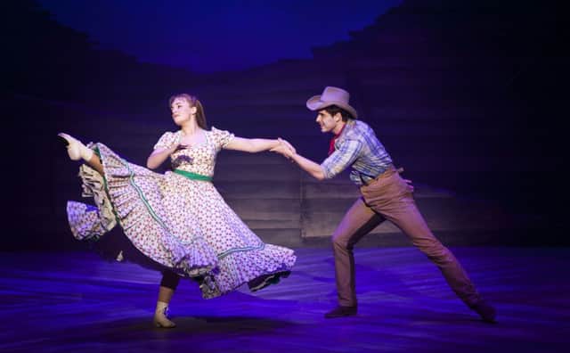 Charlotte Wakefield as Laurey and Ashley Day as Curley in a production of Oklahoma! that maximises the musicals strengths