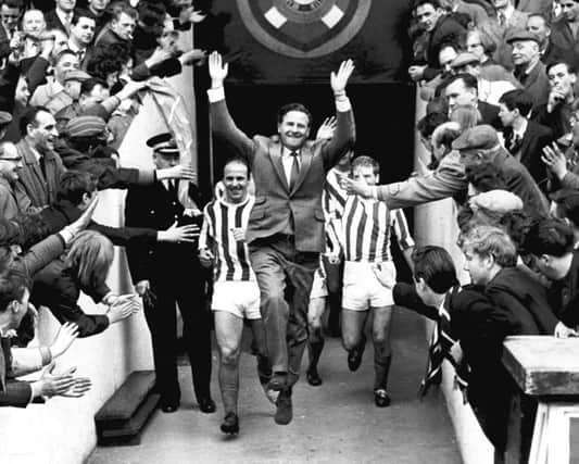 Kilmarnock manager Willie Waddell leads his team out to celebrate at Tynecastle. Picture: Daily Record
