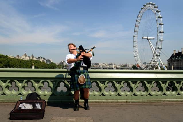 A piper plays on Westminster Bridge. Picture: Getty