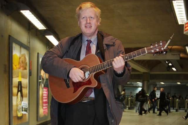 Boris Johnson seen "busking" at a London Underground station. Picture: Getty